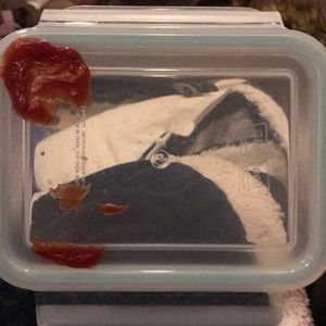 Lid with dried ketchup on top